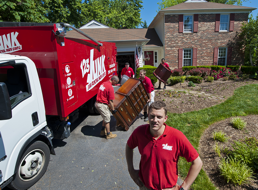 Collin standing by 123JUNK Truck